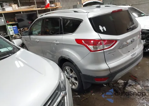 2016 Ford Escape Titanium z USA, uszkodzony, nr VIN 1FMCU9J97GUC36498